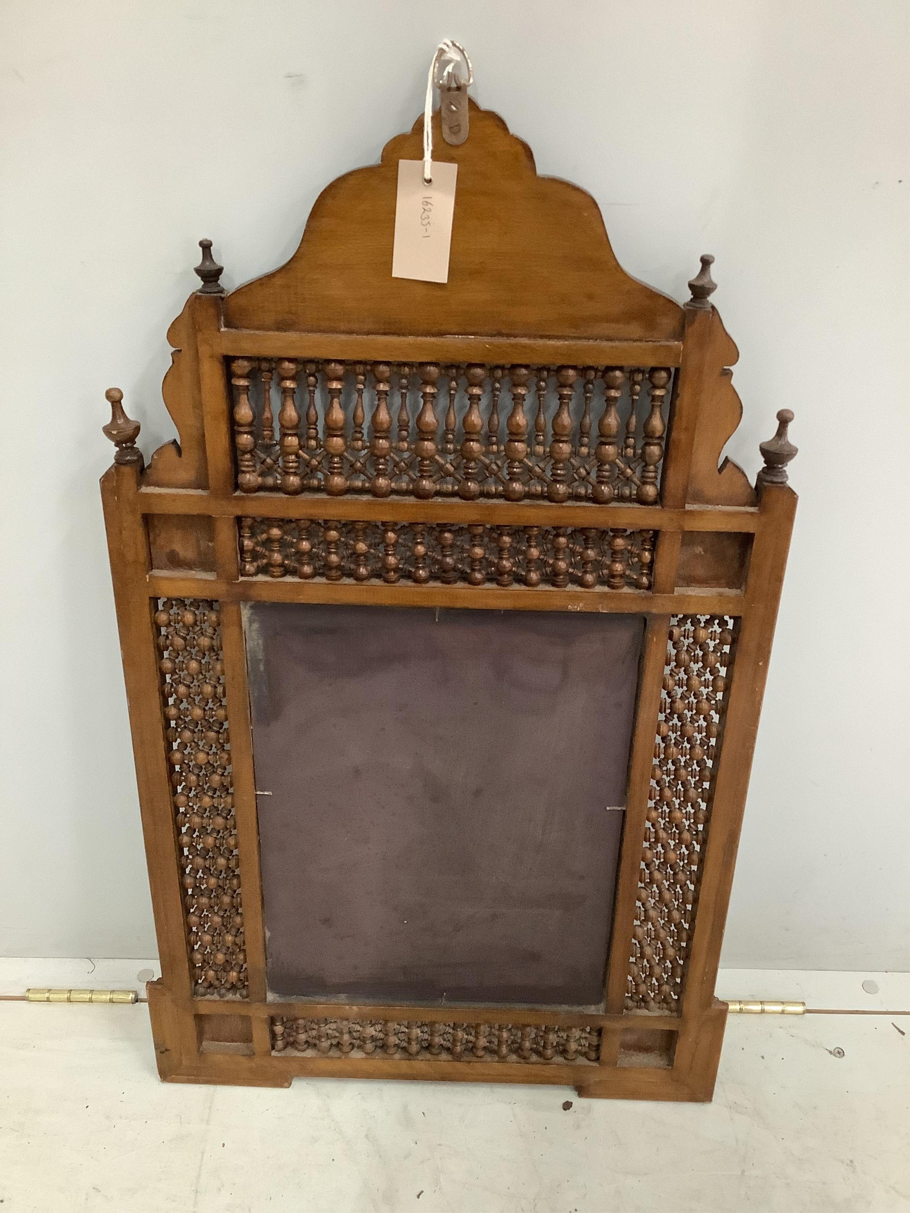 A Moorish mother of pearl inlaid wall mirror, width 52cm, height 87cm. Condition - fair